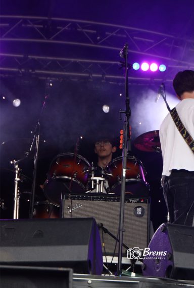 A member of Nook band playing drums