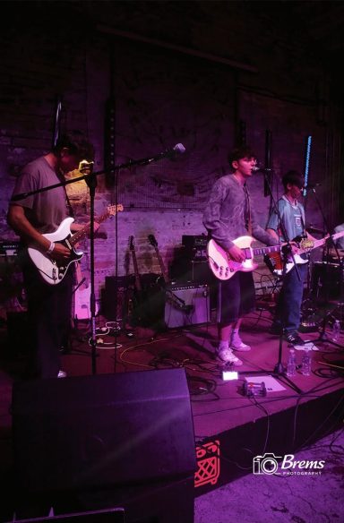 Members of Nook band playing at an event