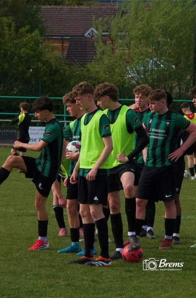 Football players warming up at a football match