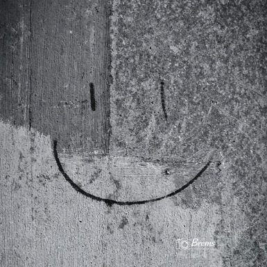 A smiley face on a window in Huddersfield
